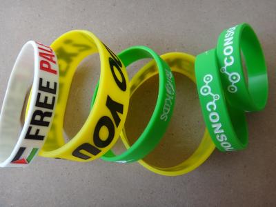 China Yellow White Green Custom Wristbands Bracelets / Personalized Silicone Bracelets for sale