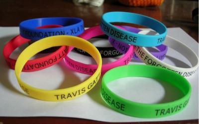 China Silicone Colored Rubber Bracelets With Silk Screen Print  202 * 12 * 2mm for sale