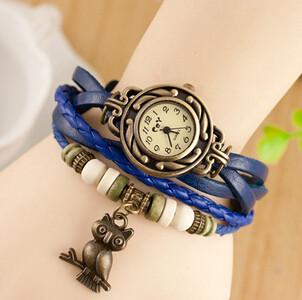 China Elegance Weave Wrap Synthetic Leather Bracelet Watches Womens With Owl Pendant for sale