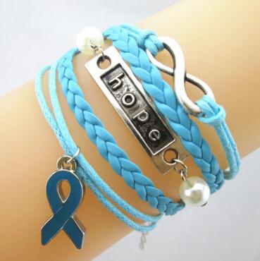 China Leather Wrap Breast Cancer Awareness Bracelet Charm With Blue Ribbon for sale