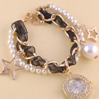 China Fashion Women Faux Pearl Chain Bracelet Geneva Flower Watch Star Pendant With Silk Ribbon for sale