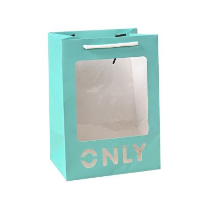 China INS Window Gift Bag Birthday Flower Recyclable Creative Transparent Handbag With Hand Paper Bag Packaging Stain for sale