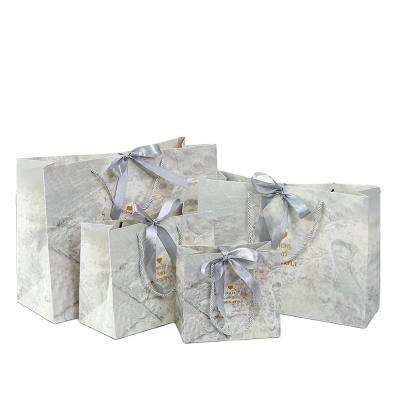 China Recyclable Wedding Candy Gift Fashion Marble Gift Bag Custom Clothing Store Paper Bag for sale