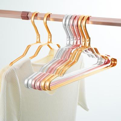 China Sturdy Wholesale Garment Hanger Metal Aluminum Alloy Gold Hanger For Clothes Fashion for sale