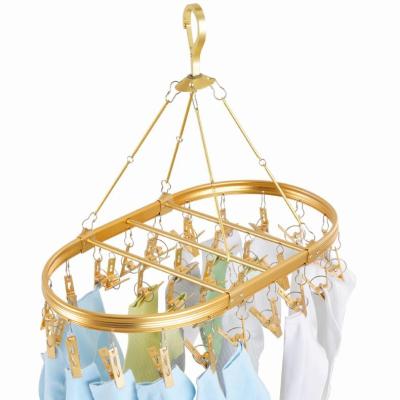 China Sturdy Multi Purpose Hanger Sock Clips Fancy Metal Clothes Drying Rack Family for sale