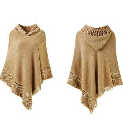 China New autumn acrylic hooded female winter cap fashion shawl large size sweater fringed loose cape for sale