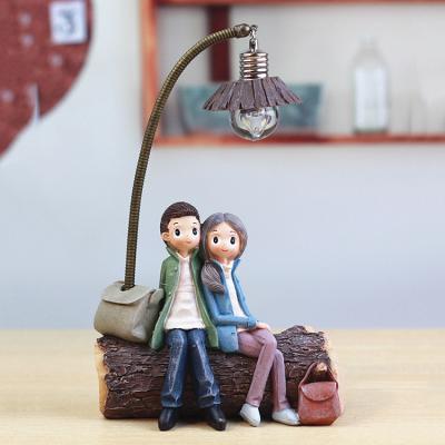 China Europe lovers figure decorations night lights boys and girls small cartoon figurine for sale