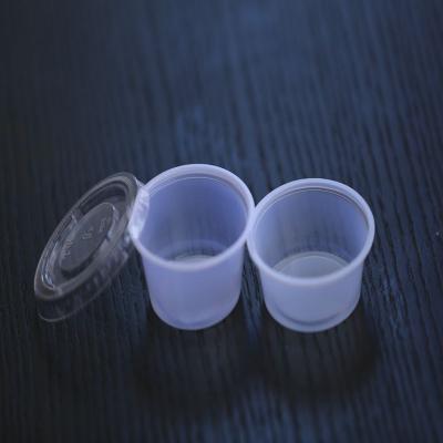 China 2oz 50ml Disposable Fast Food Plastic Sauce Container Disposable Cup With Lid for sale