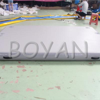 China 0.6mm PVC Tarpaulin / 0.9mm PVC Tarpaulin Factory Supply PVC Air Pontoon Dock Commercial Floating Inflatable Platform for sale