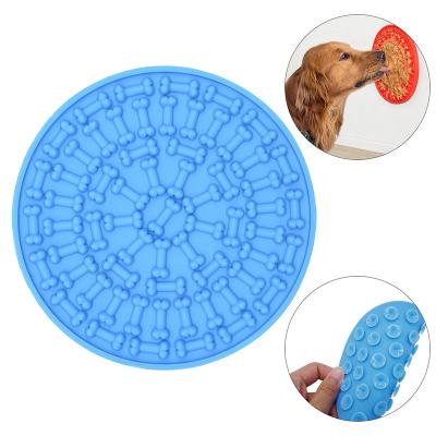 China Sustainable Silicone Slow Eating Dog Lick Pad With Suction To Wall Safe Material Mat Bow Dog Lick Mat for sale