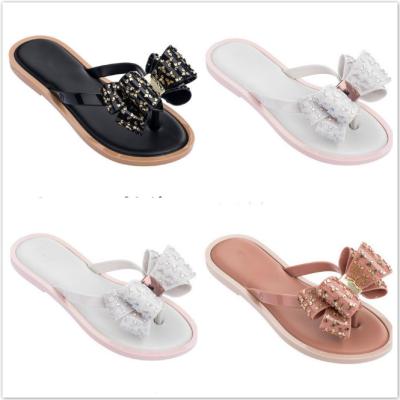 China New MELiSSA Anti-Slippery Korean Version Bowtie Slippers Flat Sandals Flip Flops For Ladies Holiday Beach Non-slip Shoes for sale