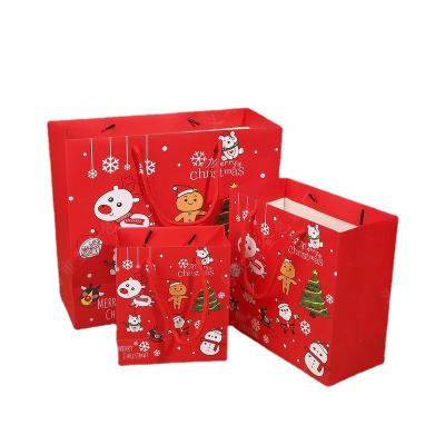 China Reused Santa Claus Gift Bags Wholesale Custom Print Paper Materials Cartoon With Logo Christmas Bags For Gift for sale