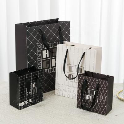 China Wholesale Materials 2023 Custom Pattern Recycled Black White Luxury Gift Shopping Bag For Paper Bag for sale