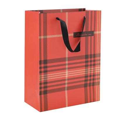 China High Quality Recycled Materials Customized Logo Printed Paper Bag For Gift And Apparel Packaging for sale