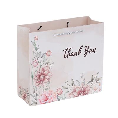 China Recyclable Retail Customizable Exquisite Luxury Unique Handheld Paper Bag for Gifts Gift Packaging, Wedding, Shopping Mall for sale