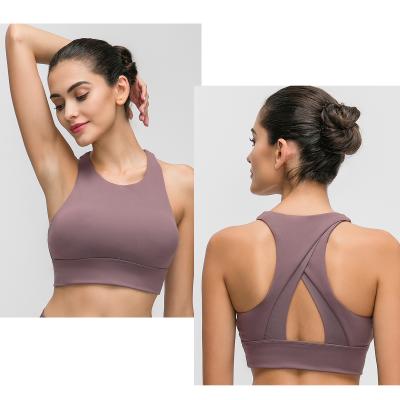 China Breathable Women Sports Bra Absorb Sweat Shockproof Padded Sports Bra Top for sale