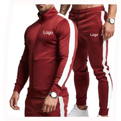 China Custom Anti-Wrinkle Training Wholesale Gym Tracksuits Men Jogging Tracksuit for sale