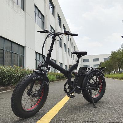 China Aluminum Alloy PETRIGO TUV 20 Inch Full Suspension Fat Tire Frame Bike 48v 500w Rear Hub Drive Electric Bicycle Mini Fat Tire Electric Bicycle for sale