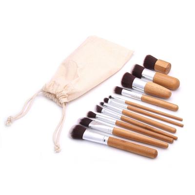 China Angular Blush Bamboo Handle New Style 11 Pcs Synthetic Hair Makeup Brush Set for sale