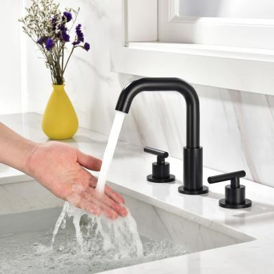 China Metered Faucets wholesale matte black bathroom faucet double handle torneira deck mounted basin faucets for bathroom sinks for sale