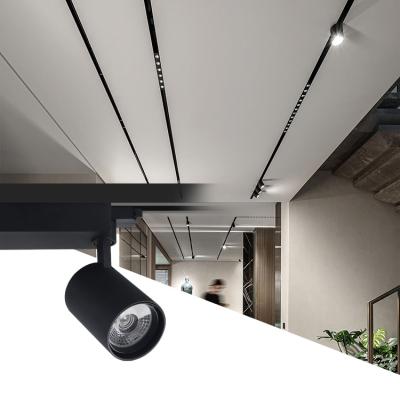 China Modern Commercial Grill Spots Led CCT Track Lighting System Focus Adjustable Ceiling Led Cob Track Spot Light for sale