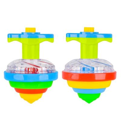 China 12 PCS Novelty Bulk Toys Trendy Gifts Led Light Up Flashing UFO Bouncing Spinning Tops for sale