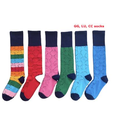 China 2022 Breathable Winter Wholesale Letter Autumn Cotton Women's Long G Tube Socks Designer Unisex Socks Famous Brand for sale