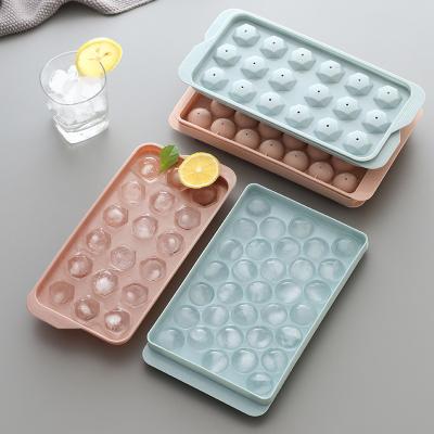 China Easy Release YMJ 33pcs Ball Ice Cube Maker Mold Round Ice Cube Tray With Lid And Bin For Freezer With Container Mini Circle Ice Cube Tray Making for sale