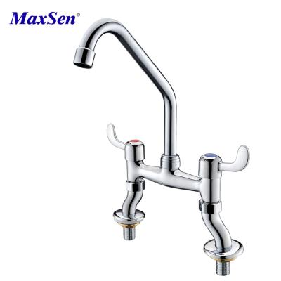 China UPC Modern Brass Commercial 2 Hole Kitchen Mixer Taps With 360 Rotate Swivel Faucet Spout for sale