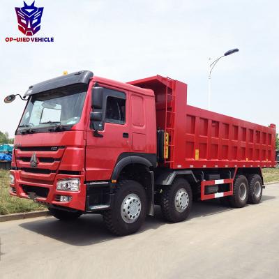 China Brand New Sinotruck 8x4 Tipper Truck Howo Dump Truck Price > 8L for sale