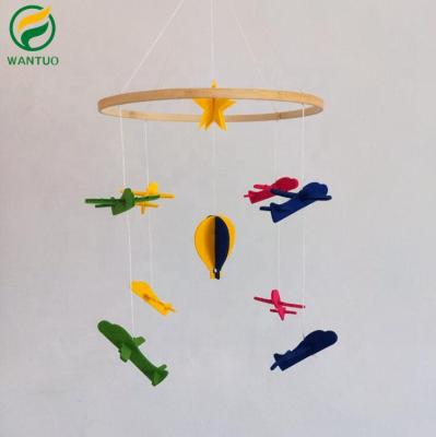 China Eco-Friendly Photo Room Wooden Prop Hanging Musical Wooden Toys Rainbow Raindrops Girl Clothes Hanger Felt Baby Crib Mobile for sale