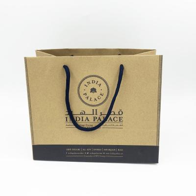 China Disposable Kraft Paper Bag With Handle for sale