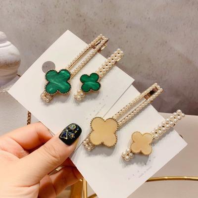 China Good Quality Women Girls Pearl Hair Clips For Bling Platypus Hairpins Bling Leaf Clover New Korean Fashion Eco-friendly Hot Sale Four for sale