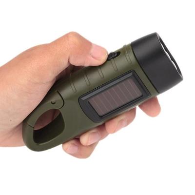 China Camping Solar Powered Rechargeable Flashlight Hand Crank Dynamo LED Light Lamp Charging Powerful Torch For Self Defense Outdoor Camping for sale