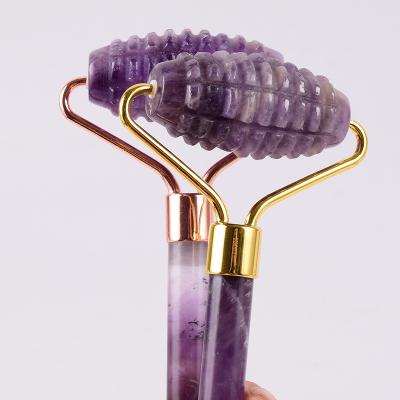 China Healthy Hand Held Amethyst Jade Facial Massage Roller Spike Face Roller for sale