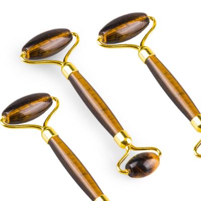 China Healthy Natural Tiger Eye Jade Roller Gemstone Tigerite Stone Gua Sha Massage Tool for sale