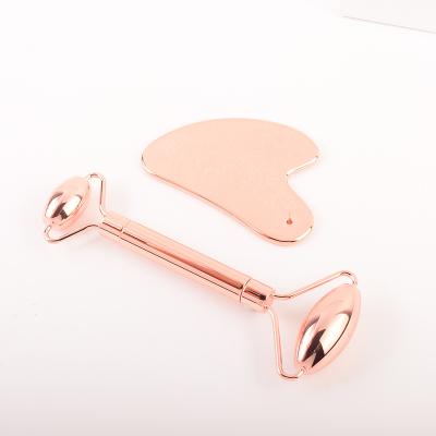 China Lift Skin Rose Gold Color Stainless Steel Facial Massage Tool Roller Gua Sha Set for sale