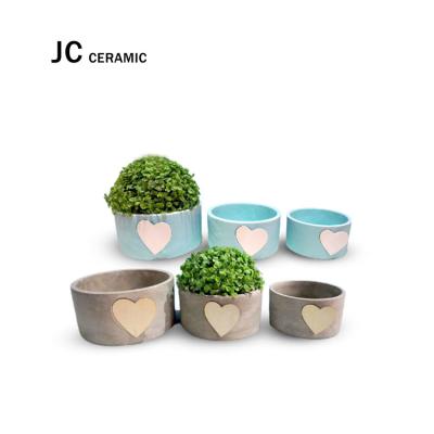 China Cartoon JC Cement Flower Pots and Planters Decorative Round Plant Pots Wholesale, Small Blue Cylinder Heart Indoor Planters for sale