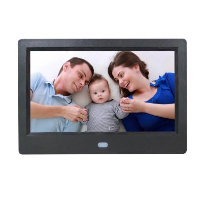 China Hot 7 inch digital clock XCLT LCD display photo frame digital autoplay video image for sale