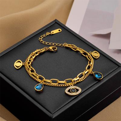 China Lead Free Shiny Blue Silver Chain Nickel Blue Eye Bracelet Turkish Jewelry Crystal Evil Eyes Bracelet Gold Rose Gold Layered Stainless Steel for sale