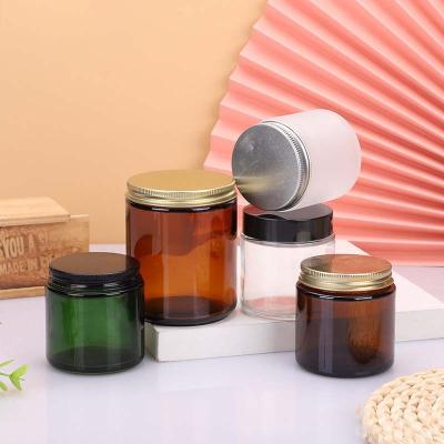 China Gift & Wholesale Craft Logo Customize Empty 100ML 250ML 500ML Round Clear Amber Gold Aluminum Metal Frosted Black Lid Glass Candle Jar With for sale