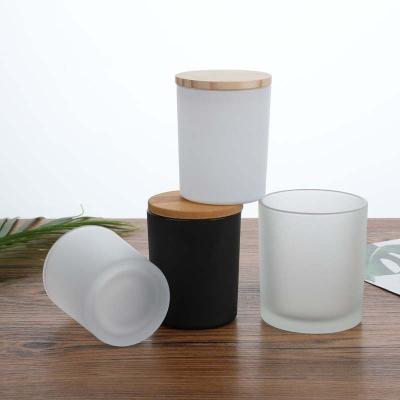 China Gift & Craft Wholesale 200ml 320ml Matte Glossy Black White Frosted Green Customized Logo Wood Lid Glass Candle Holder Jar With Gift Box for sale