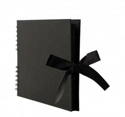 China Unique Design 40 Black Hardcover Inner Covers 8 X12 Inch White Kraft Paper Hardcover Spiral Album Notebook for sale