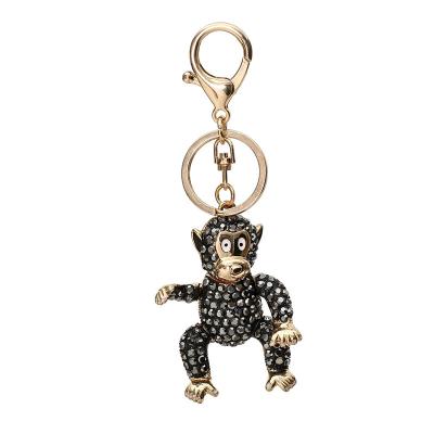 China Custom Key Decoration Porcelain Gorilla Key Chain Metal for sale