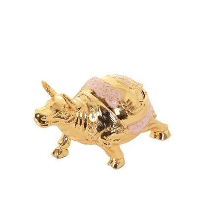 China Decoration Metal Cow Ashtray Silver Coin Ox Zinc Alloy For Home Decoration for sale