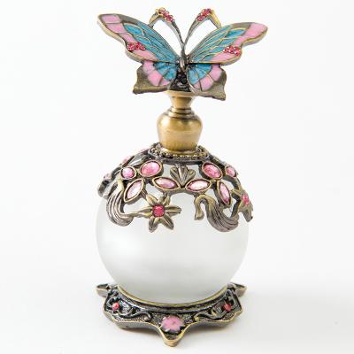 China PERFUME New 25ml Metal Essential Oil Butterfly Perfume Glass Luxury Zinc Alloy Bottle for sale