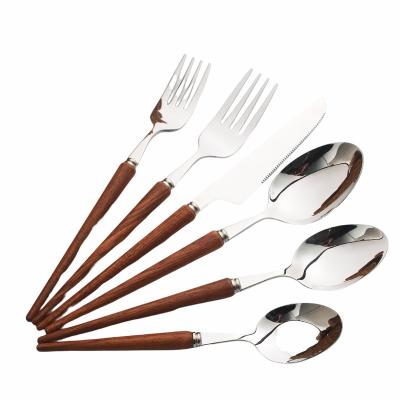 China Viable hot sale wooden handle 304 stainless steel cutlery knife fork spoon rosewood silverware for restaurant flatware set for sale