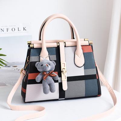 China Newspaper used bag 2021 European stylish handbags trend large capacity fashion bag female large the new single shoulder and American lady handbag for sale