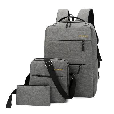 China With USB rucksack business backpack custom logo fashion large capacity three-piece school bag with USB for sale