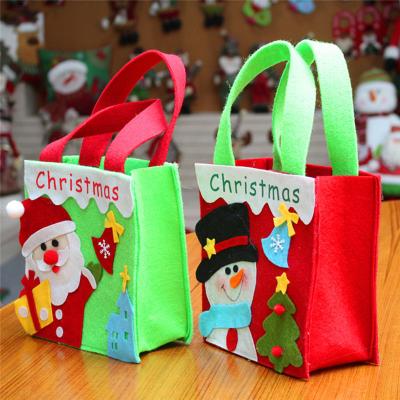 China Festival Decoration Bulk Christmas Gifts Home Held Grocery Bag Storage Dispenser Portable Christmas Party Festive Gift Bags For Christmas Storage Bag for sale